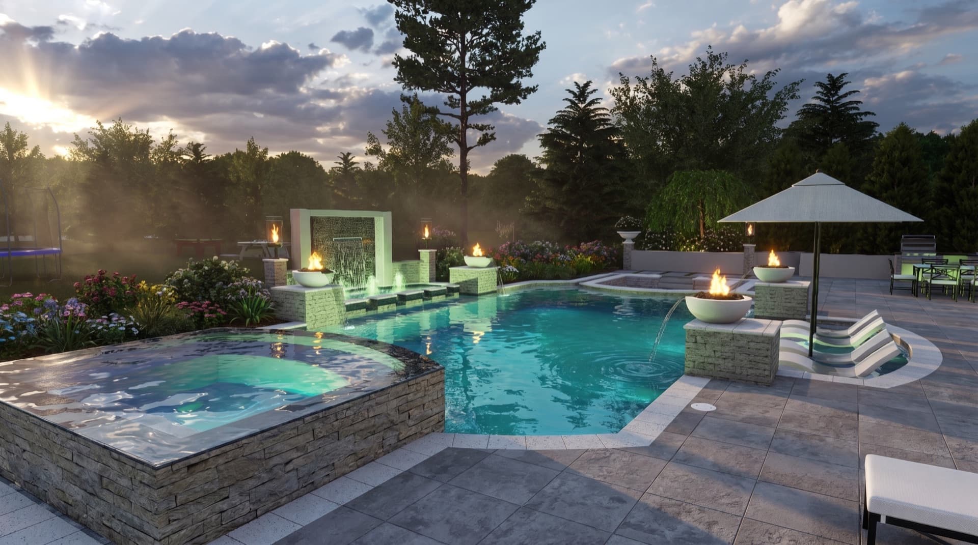 Twilight pool with lit water-wall feature, fire bowls, and raised spa